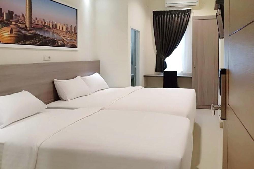 Twospaces Living At Maximus Inn Palembang Eksteriør billede